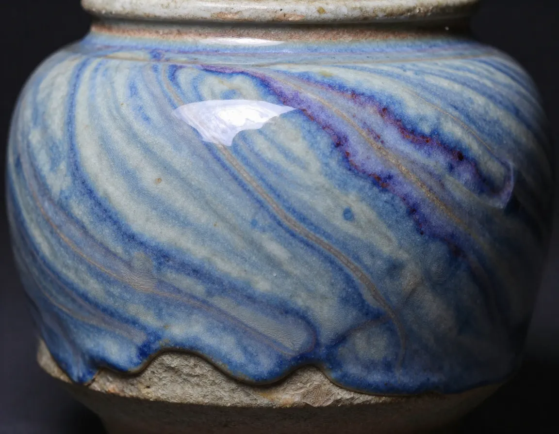 Unique artisan handcrafted ceramic tea jar with one of a kind glaze