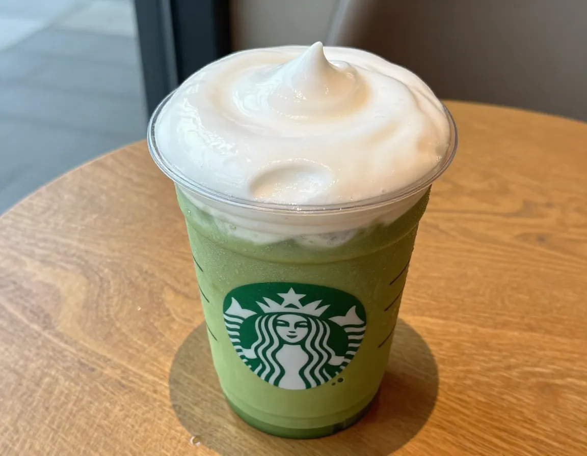 Iced matcha tea latte with vanilla sweet cream cold foam