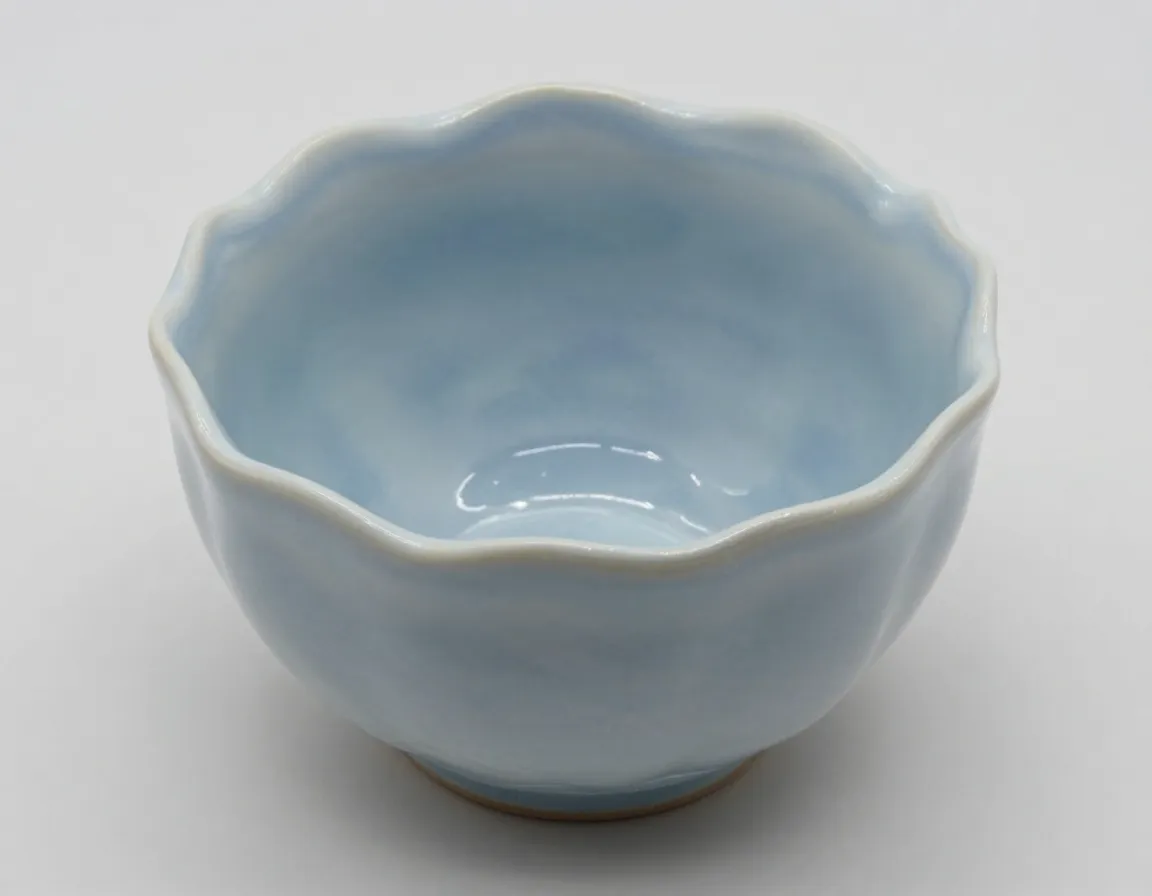 Organic wave form misty blue undulating rim ceramic mug